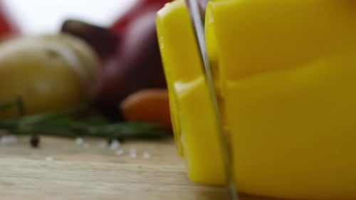 Bright Yellow Bell Pepper Being Sliced