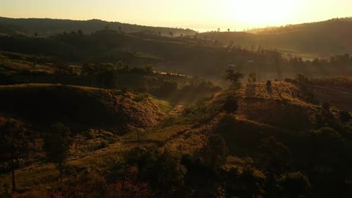 4K Morning mist over a rural village in the high mountains.