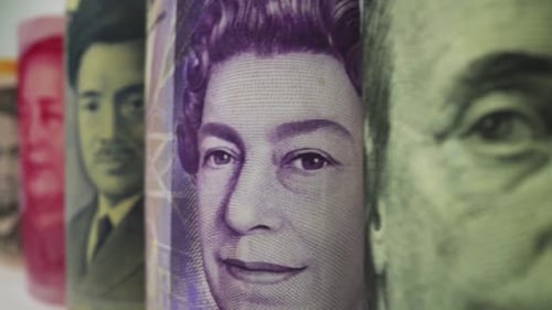 Foreign currency money exchange concept. Many banknotes of different nations.