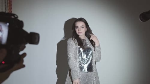 Woman Posing for Fashion Shoot in Studio