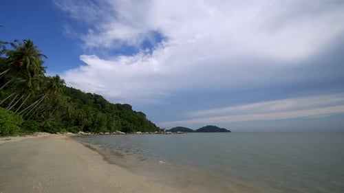Panning right the beach to sea
