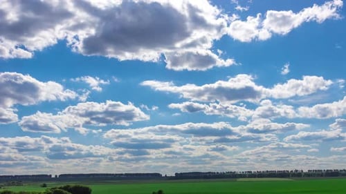 Clouds Over Green Fields