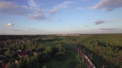 Aerial View of Freight Train Running in the Countryside, Russia