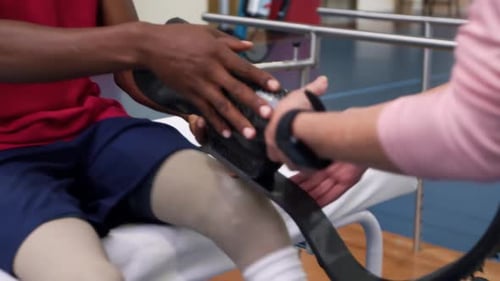 Fitting Leg Prosthetic in Rehabilitation Clinic
