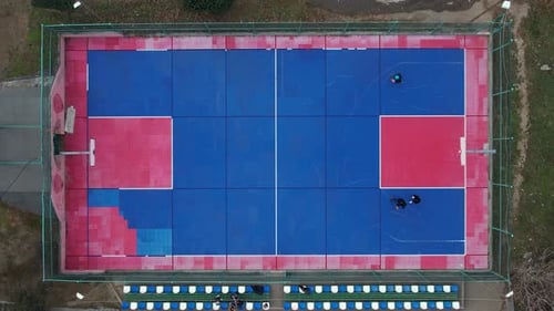 Teenagers Play Street Basketball