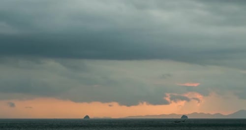 Time-lapse of Light Rays Over the Sea or Ocean at Sunset. Hot Summer Weather at Tropical