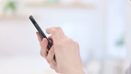Close Up of Woman Hands Using Smartphone