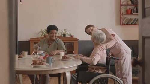 Old Ladies Having Breakfast in Nursing Home