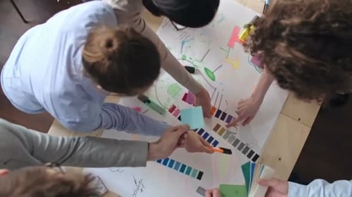 Team Brainstorming Design Solutions in the Office