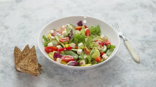 Fresh Salad with Toast in Natural Daylight