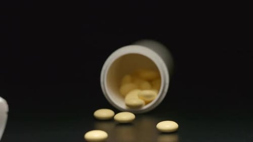 Plastic tube falls and pills with cover fall out of him