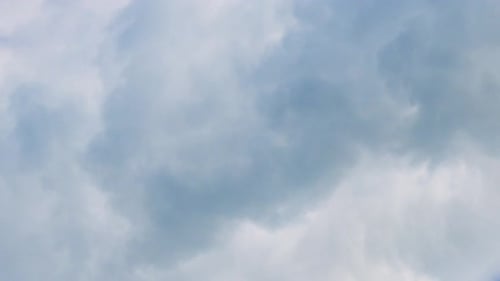 Closeup on a Gray and White Smoke From a Smokestack