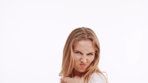 Woman punches and smiles