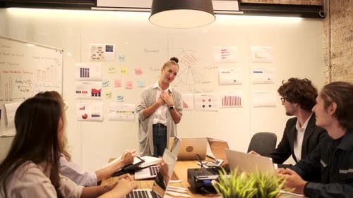 Meeting of multiracial professional teamwork with coworkers at the business office.