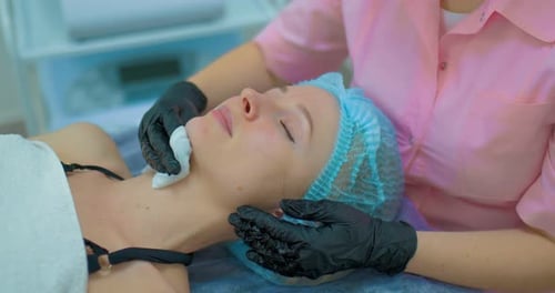 Woman Receives a Relaxing Facial at a Spa