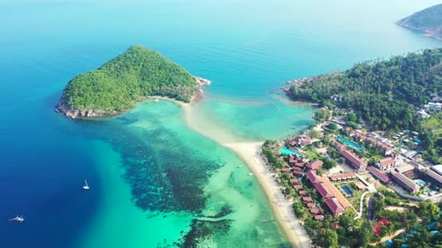 Paradise vacations resort on Thai seaside with white sandy beach and calm turquoise lagoon on tropic