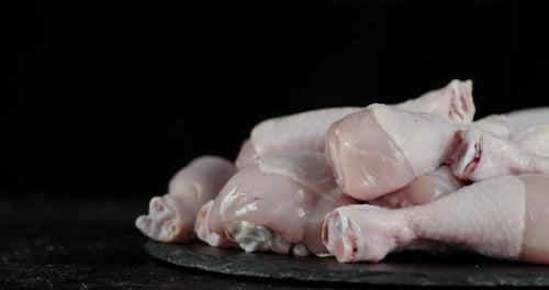 Pile of Raw Chicken Drumsticks, Close Up