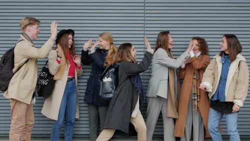 Enthusiastic Young Adults Engaging in Playful Fun