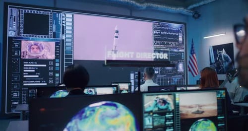 Unrecognizable Team Watching Spacecraft Launch