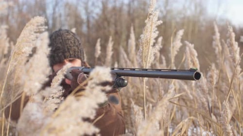 Young Active Man Is Spending Time on Shooting