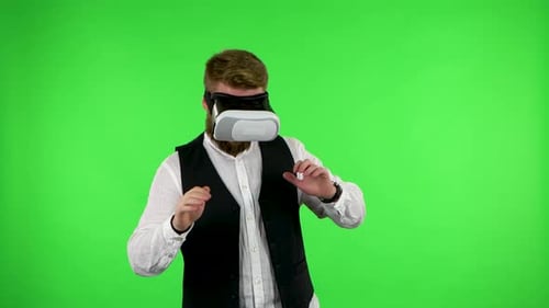 Man with Virtual Reality Headset or 3d Glasses. Green Screen