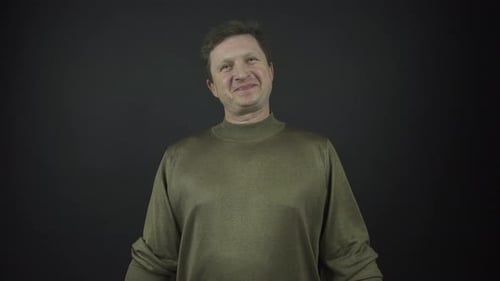 Man in Brown Sweater Smiling