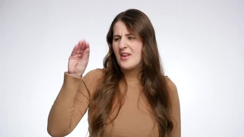 Woman Expressing Disagreement With Hand Gesture