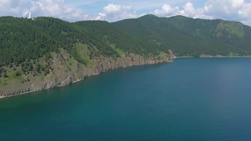 Flight Over the Rocky Shore of Lake