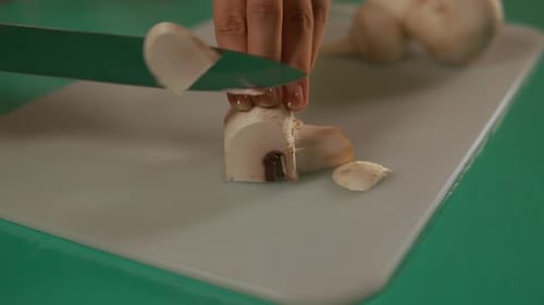 Mushroom Sliced on Cutting Board Close Up