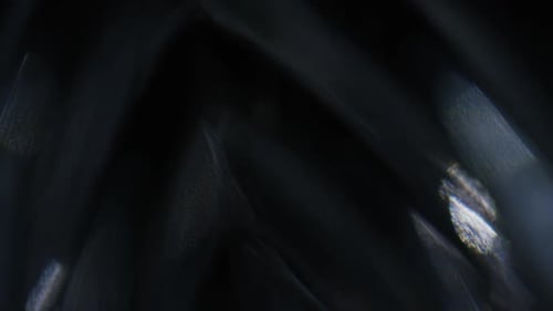 Abstract Textured Light Patterns on Dark Background