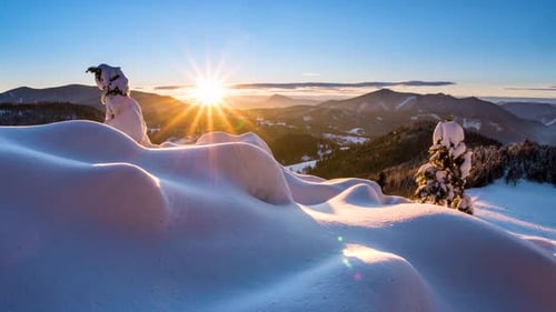Beautiful Sunrise in Snowy Mountains Nature in Cold Blue Winter