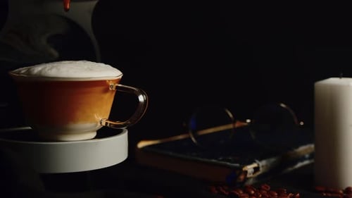 Cup of coffee with foam being made