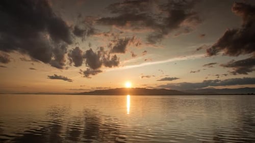 Golden Sunset Over the Calm Ocean Waters