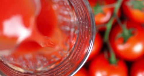 The Juice From the Tomatoes Poured Into the Glass