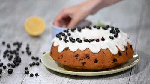 Decorating Ring Cake With Berries And Icing