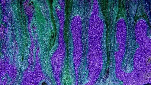 Abstract Paint Mixing Neon Blue Green and Violet Purple Colors Ink