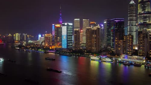 Shanghai River Urban Cityscape Aerial Skyline Panorama Timelapse at Night Zoom Out
