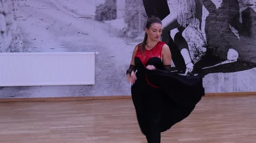 Elegant Woman Performing Dance Routine in Studio