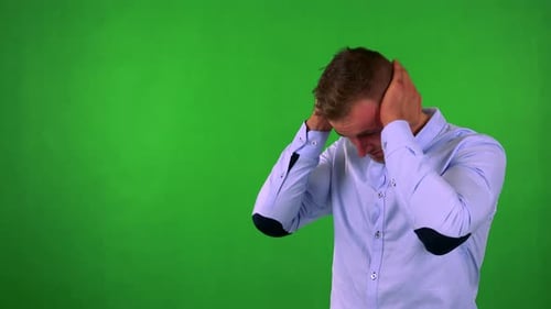 Young Handsome Business Man Has Depresion - Green Screen - Studio