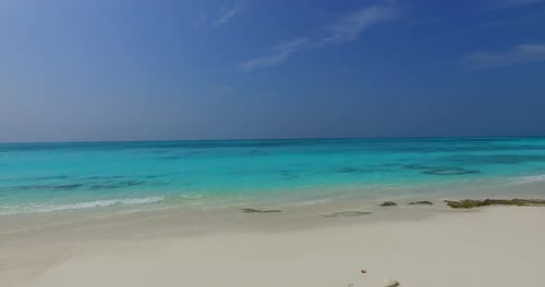 Beautiful above copy space shot of a sunshine white sandy paradise beach and turquoise sea backgroun