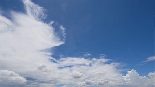 Time lapse of white cloud moving pass around sky background