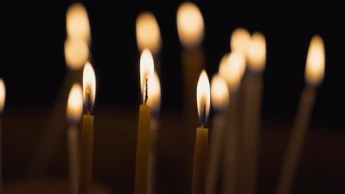 Candles burning inside the church