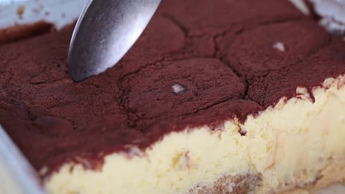 Eating Tiramisu with Spoon Closeup