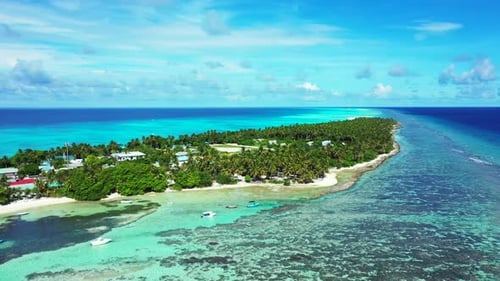 Aerial above scenery of perfect seashore beach vacation by blue lagoon with bright sand background o