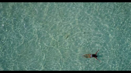 Lady alone loves life on perfect sea view beach journey by clear ocean with white sand background of
