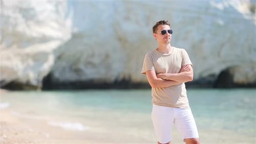 Young Man on the White Beach