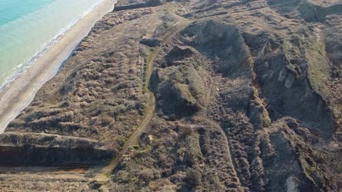 Aerial view drone flies near the sea. Wide view of the water. Beautiful blue sea.