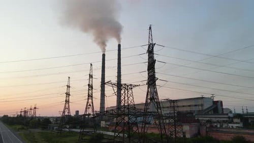Aerial View of Coal Power Plant High Pipes with Black Smoke Moving Upwards Polluting Atmosphere at