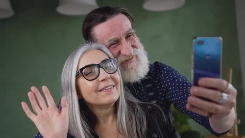 Senior Couple Taking Happy Selfie Together