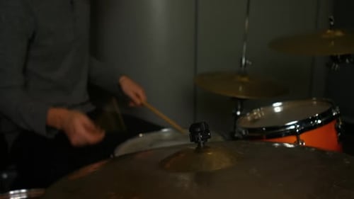 Drummer Playing Drums in Music Studio